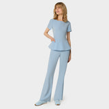 Bluza medyczna KIM Baby Blue z subtelną baskinką - krótki rękaw i dwie kieszonki - Vena Uniformy