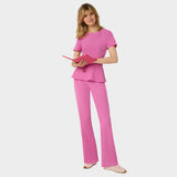 Bluza medyczna damska z baskinką KIM w kolorze Disco Pink - kobieca, taliowana - Vena Uniformy