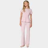 Bluza medyczna damska z baskinką KIM w kolorze Pastel Pink - kobieca, taliowana - Vena Uniformy